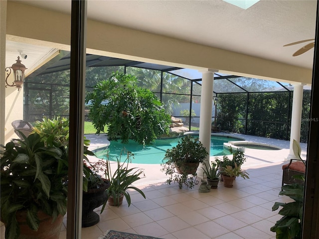 view of pool featuring a fenced in pool, a patio, an in ground hot tub, a lanai, and a ceiling fan