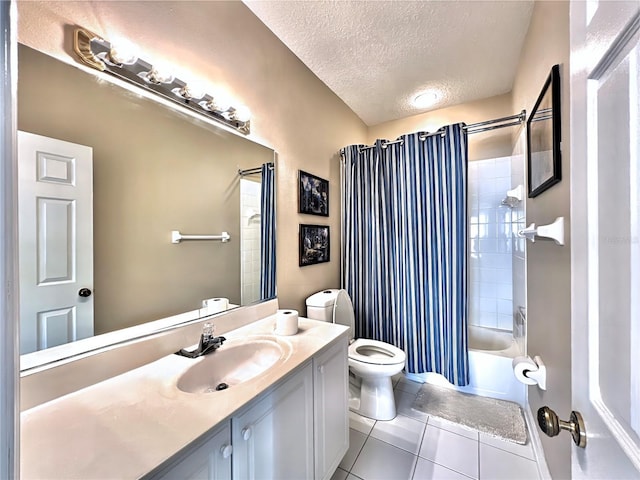 bathroom with tile patterned floors, shower / bath combo, toilet, vanity, and a textured ceiling