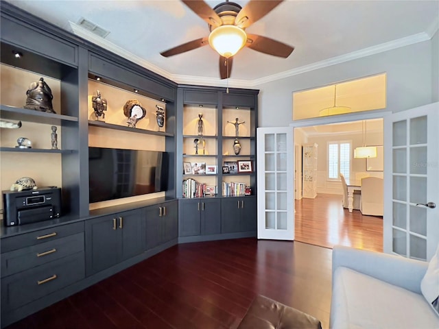 unfurnished living room with dark wood-style flooring, ceiling fan, visible vents, ornamental molding, and french doors