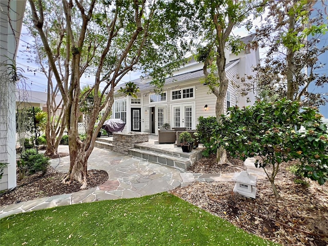 exterior space featuring a patio and french doors
