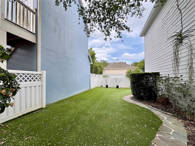view of yard with fence