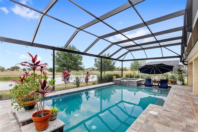 view of swimming pool featuring a lanai, a patio area, and a pool with connected hot tub