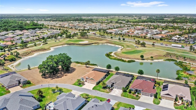 aerial view featuring a residential view and a water view