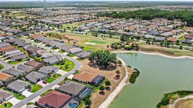 bird's eye view with a residential view, a water view, and golf course view