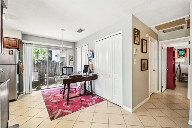 1239 E Ridgewood St, Orlando, FL 32803 - office featuring baseboards, visible vents, light tile patterned floors, and attic access