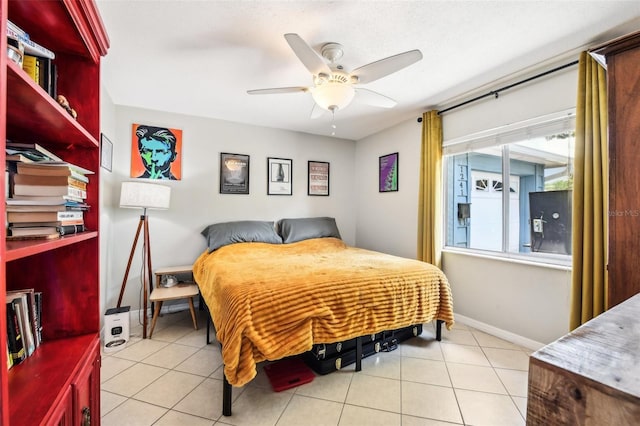 1239 E Ridgewood St, Orlando, FL 32803 - bedroom featuring tile patterned floors, ceiling fan, and baseboards