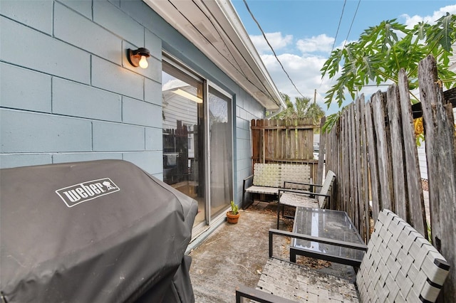 1239 E Ridgewood St, Orlando, FL 32803 - view of patio featuring fence and grilling area