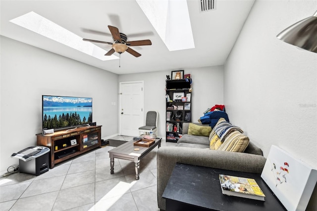 1239 E Ridgewood St, Orlando, FL 32803 - living area with a ceiling fan, a skylight, visible vents, and light tile patterned flooring