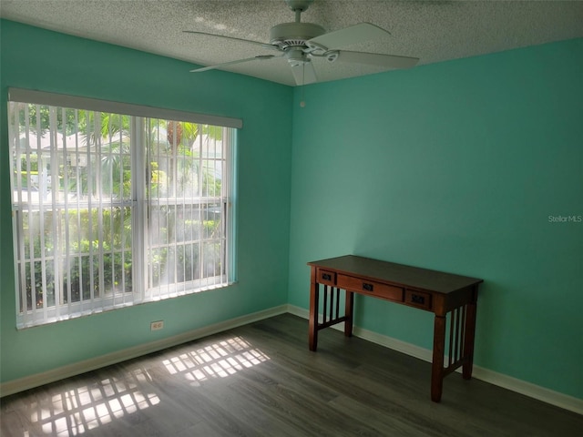 3586 Eversholt St, Clermont, FL 34711 - spare room featuring ceiling fan, wood finished floors, a textured ceiling, and baseboards