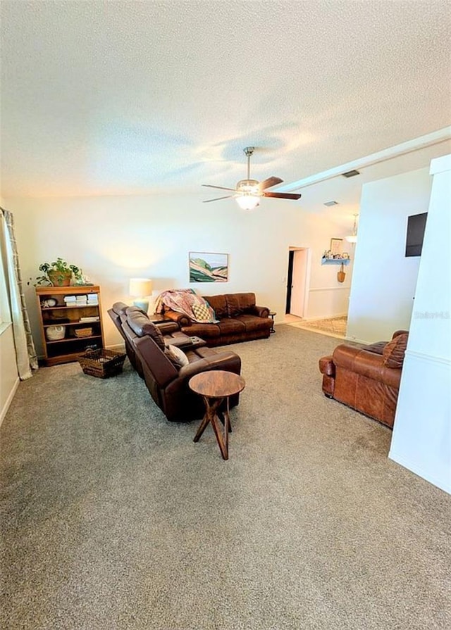 600 Lake St, Fruitland Park, FL 34731 - living room featuring visible vents, ceiling fan, a textured ceiling, and carpet floors