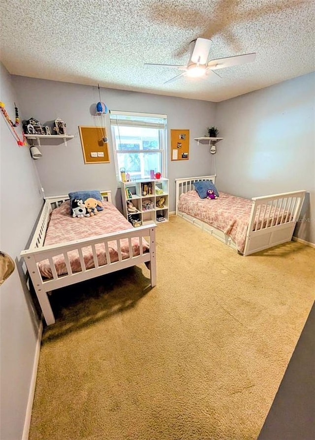 600 Lake St, Fruitland Park, FL 34731 - carpeted bedroom featuring a textured ceiling, ceiling fan, and baseboards