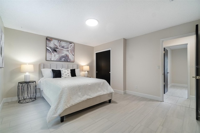 bedroom with baseboards