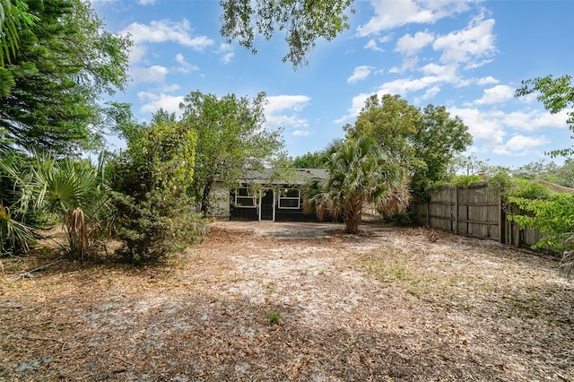 view of yard featuring fence