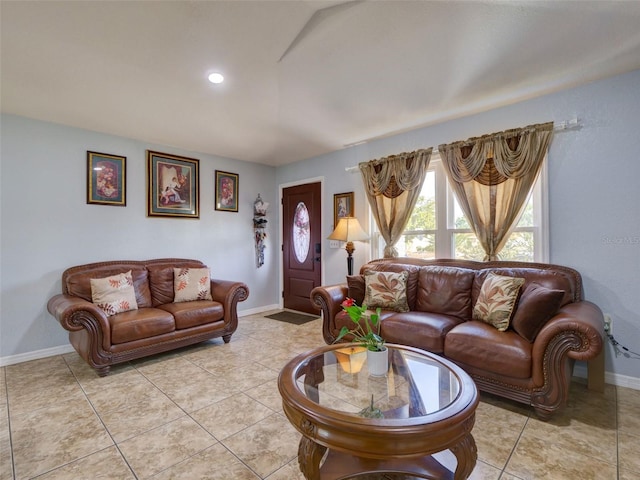 living area with light tile patterned floors, recessed lighting, and baseboards