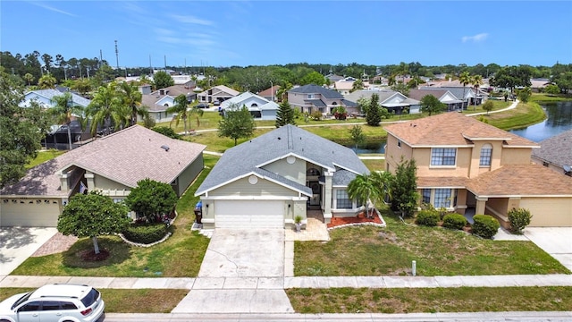 1021 Whalebone Bay Dr, Kissimmee, FL 34741 - drone / aerial view with a residential view and a water view