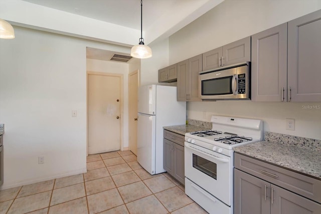 kitchen featuring gray cabinetry, visible vents, white appliances, and light tile patterned flooring