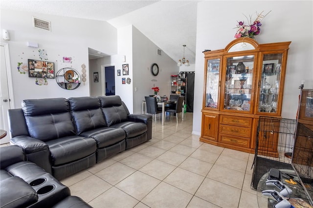 349 Caldbeck Way, Kissimmee, FL 34758 - living room featuring light tile patterned flooring, a notable chandelier, visible vents, and lofted ceiling
