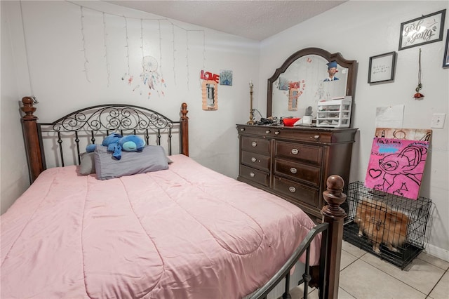 349 Caldbeck Way, Kissimmee, FL 34758 - bedroom featuring a textured ceiling and light tile patterned floors