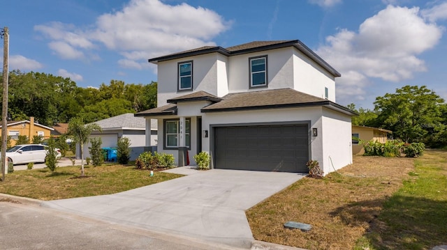 2041 Warrens Ave, Maitland, FL 32751 - view of front facade with stucco siding, concrete driveway, a front lawn, and a garage