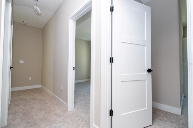 2041 Warrens Ave, Maitland, FL 32751 - corridor featuring baseboards and light carpet