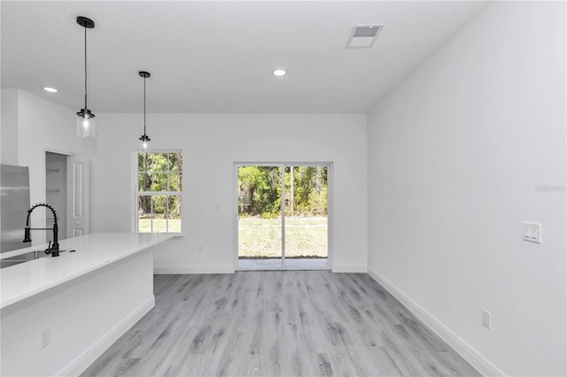 13430 SW 88th Ter, Ocala, FL 34473 - interior space featuring recessed lighting, visible vents, a sink, and light wood-type flooring