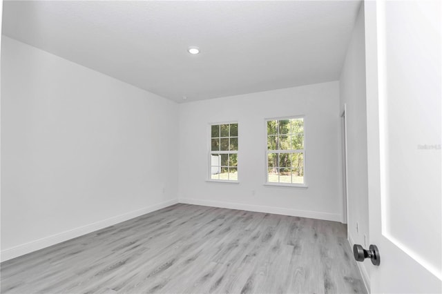 13430 SW 88th Ter, Ocala, FL 34473 - unfurnished room featuring baseboards, recessed lighting, and light wood finished floors