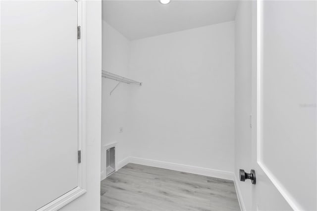 13430 SW 88th Ter, Ocala, FL 34473 - walk in closet featuring light wood finished floors
