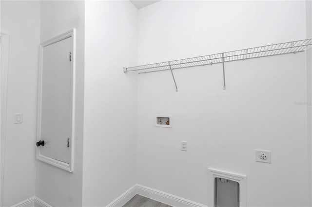 13430 SW 88th Ter, Ocala, FL 34473 - laundry room featuring washer hookup, hookup for an electric dryer, laundry area, and baseboards