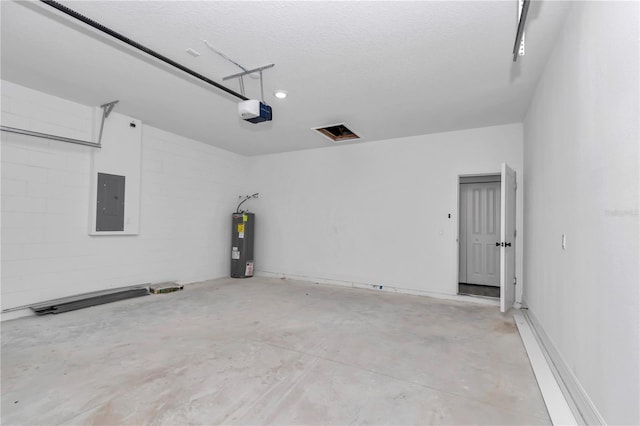 13430 SW 88th Ter, Ocala, FL 34473 - garage featuring water heater, a garage door opener, and electric panel