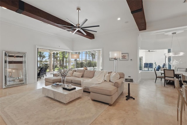 5550 Osprey Isle Ln, Orlando, FL 32819 - living room featuring beamed ceiling, recessed lighting, and ceiling fan