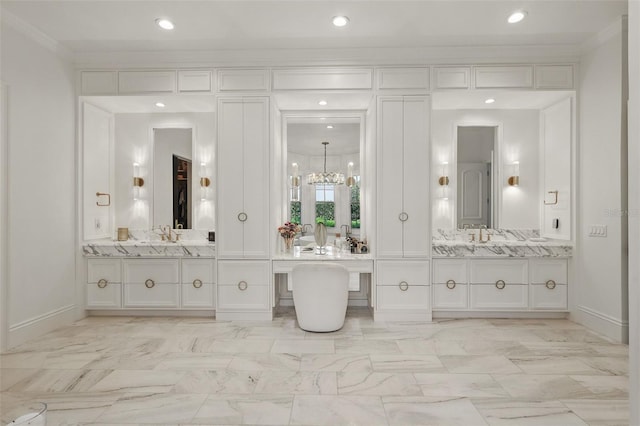 5550 Osprey Isle Ln, Orlando, FL 32819 - full bath featuring a sink, a chandelier, recessed lighting, two vanities, and ornamental molding