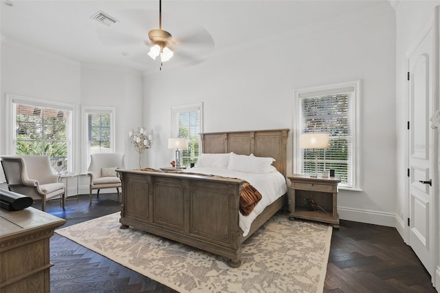 5550 Osprey Isle Ln, Orlando, FL 32819 - bedroom featuring baseboards, a ceiling fan, visible vents, and multiple windows