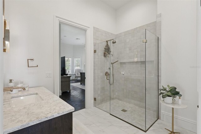 5550 Osprey Isle Ln, Orlando, FL 32819 - ensuite bathroom featuring ensuite bathroom, vanity, and a shower stall