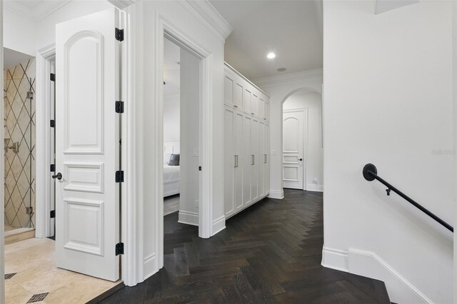 5550 Osprey Isle Ln, Orlando, FL 32819 - hallway featuring baseboards, ornamental molding, an upstairs landing, and recessed lighting