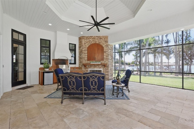 5550 Osprey Isle Ln, Orlando, FL 32819 - sunroom with coffered ceiling and a water view