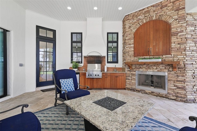 5550 Osprey Isle Ln, Orlando, FL 32819 - living area with recessed lighting, a fireplace, and wooden ceiling