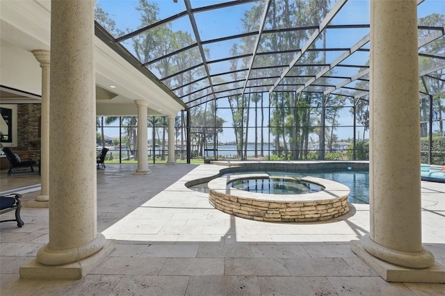 5550 Osprey Isle Ln, Orlando, FL 32819 - exterior space with a swimming pool, a patio area, and a hot tub