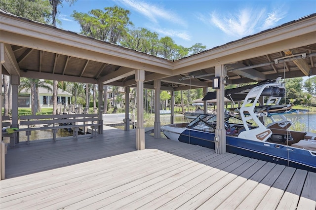 5550 Osprey Isle Ln, Orlando, FL 32819 - view of dock featuring a water view and boat lift