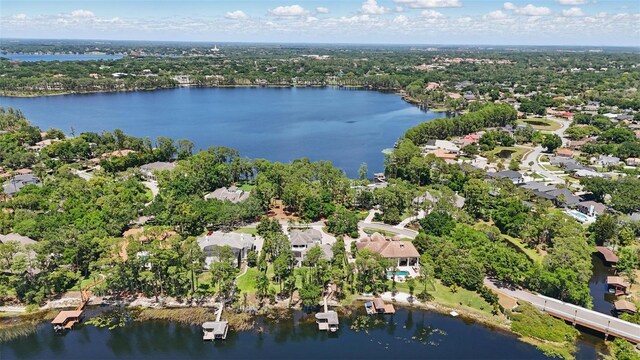 5550 Osprey Isle Ln, Orlando, FL 32819 - drone / aerial view featuring a residential view and a water view