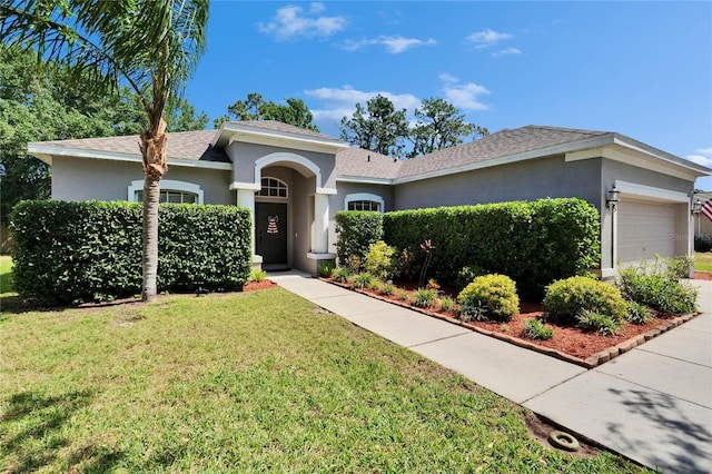 ranch-style house with a front lawn, stucco siding, roof with shingles, and an attached garage