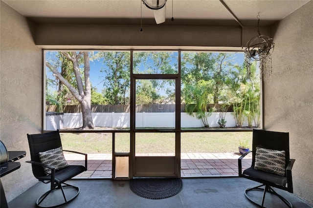 sunroom / solarium with plenty of natural light