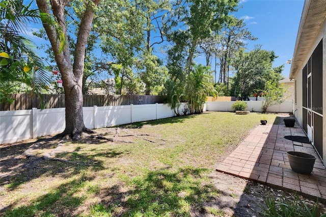 view of yard featuring a fenced backyard
