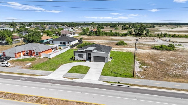 drone / aerial view with a residential view