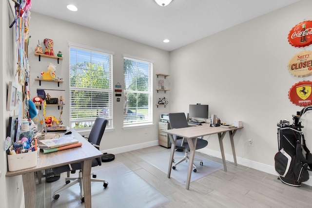 office area featuring recessed lighting, light wood finished floors, and baseboards
