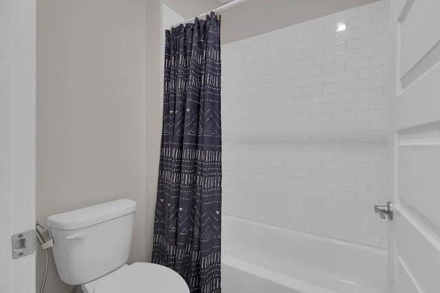 bathroom featuring toilet and shower / bathtub combination with curtain