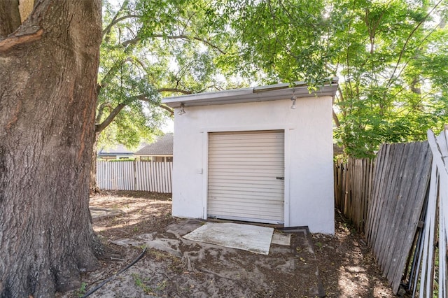 view of shed with a fenced backyard