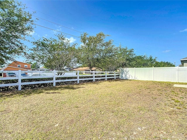 view of yard featuring fence