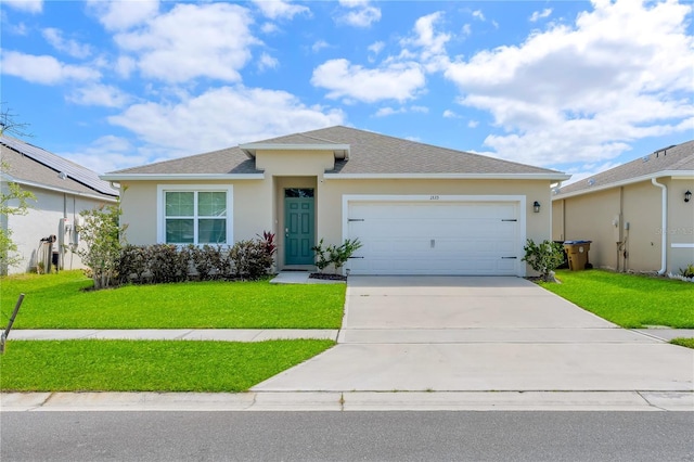 1535 Barberry Dr, Kissimmee, FL 34744 - view of front of house with a shingled roof, an attached garage, stucco siding, a front yard, and concrete driveway
