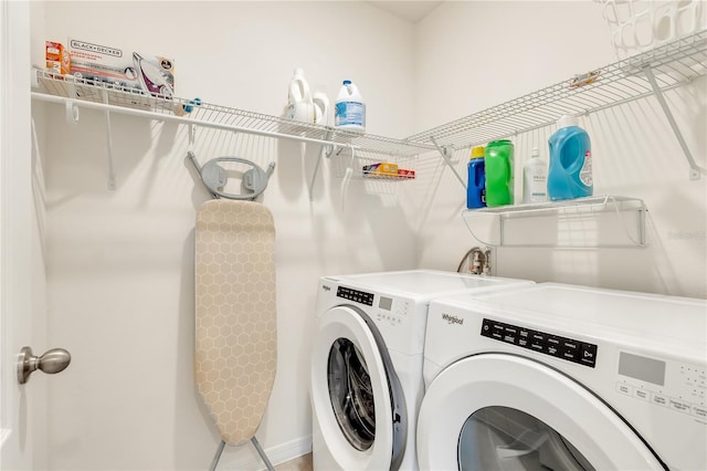 1535 Barberry Dr, Kissimmee, FL 34744 - laundry room featuring laundry area and washer and clothes dryer