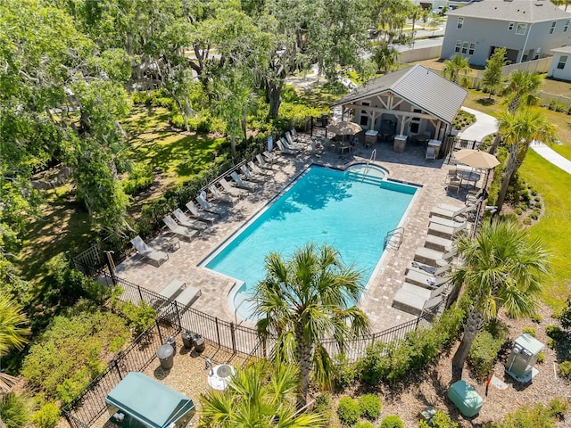 1535 Barberry Dr, Kissimmee, FL 34744 - pool featuring fence and a patio
